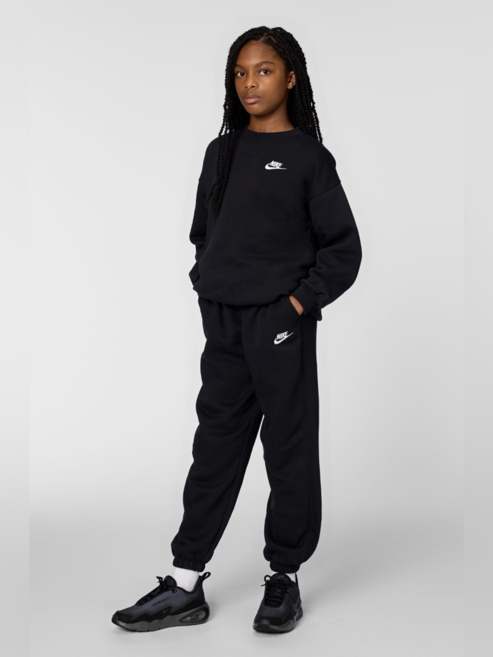 Nike Kids Black Joggers with White Swoosh Logo